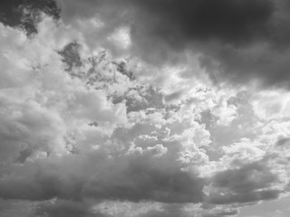 Grey sky with white and black cloud