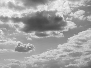 Grey sky with white and black cloud