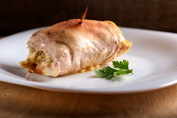 Chicken roll stuffed with cheese and musrooms baked in oven