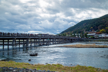 Togetsukyo Bridge in Arashiyama, Kyoto Prefecture, Japan during Koyo Autumn Leaves Festival 2018