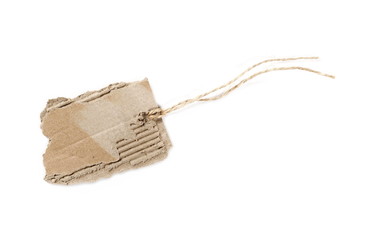 Blank cardboard price tag tied with string isolated on white background, top view