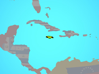 Jamaica with national flag on blue political globe.