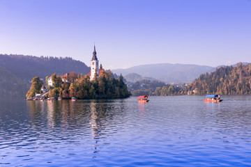 View at Bled lake and Pilgrimage Church of the Assumption of Mary after sunset, autumn