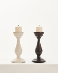 Candlestick and candle style white and black white background home ornament.