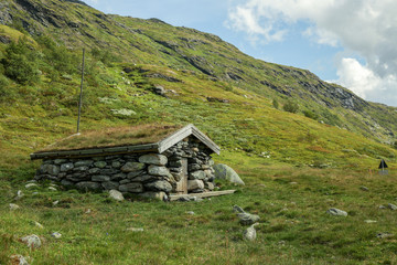 Fototapeta na wymiar house of stones in the mountains of Norway
