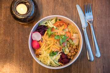 view of a bowl with delicious colorful tasty salad