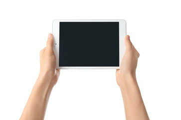 Young woman holding tablet PC on white background