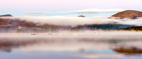 Early morning mist on Loch Lomond at Milarrochy Bay - 232274907