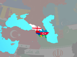 Caucasus region with national flags on blue political globe.