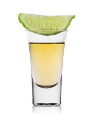 Glass of tequila with slice of lime