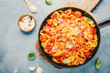 Tomato sauce spaghetti pasta on pan