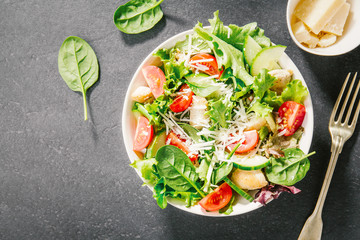Tasty fresh salad with chicken and vegetables