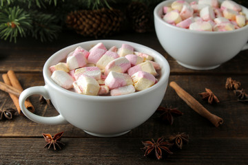 hot cocoa with marshmallows in a cup on a brown wooden background. Winter. new Year. Christmas