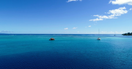 boat in aerial view, french polynesia