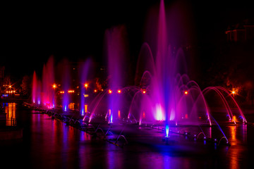 Glowing multicolored illumination fountains in the Far Eastern city of Khabarovsk.