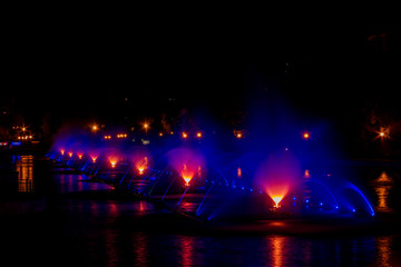 Glowing multicolored illumination fountains in the Far Eastern city of Khabarovsk.