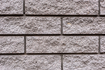full frame image of grey stone wall background
