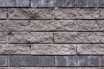 full frame image of grey stone wall background