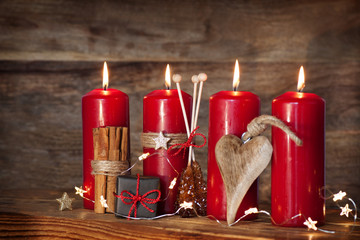 Decoration with four red advents candles