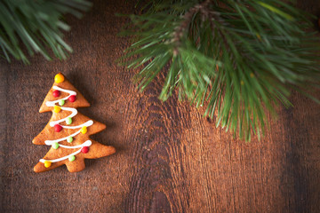 Homemade gingerbread cookies and christmas tree