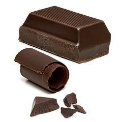 Chocolate bar with pieces and curl isolated on white background