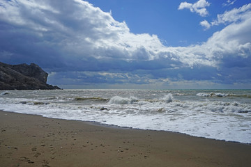 Marine landscape with a beautiful emerald waves. Sudak, Crimea.