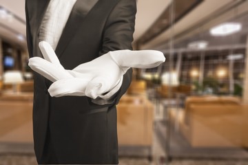 Elegant human hand in white glove