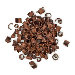 Dark chocolate curls from top view or from above isolated on white background