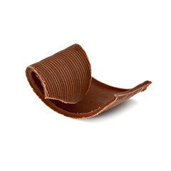 Dark chocolate curl isolated on white background