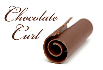 Dark chocolate curl isolated on white background