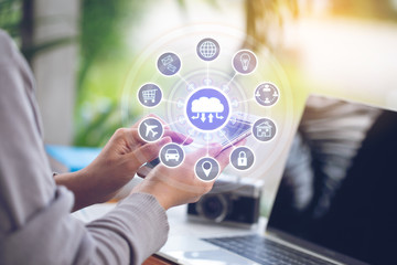 Internet of Things (IoT), Soft focus of Woman using smart phone and iot icon or hologram with in coffee shop, Communication network service and Business concept