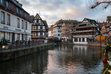 Fototapeta na wymiar River Ill and houses in the district of La Petite France in Strasbourg