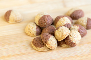 Cinnamon sandbakelse christmas cookies, two color, cocoa dark brown and vanilla light golden brown, delicious czech cookies