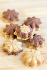 Cinnamon sandbakelse christmas cookies, two color, cocoa dark brown and vanilla light golden brown, delicious czech cookies