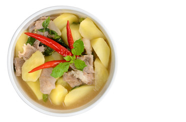 Potato soup with sliced pork and hot chilli in white background with clipping path,Thailand food