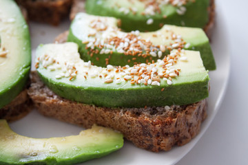 Sandwiches with avocado and grain bread