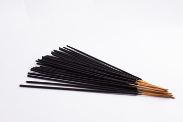 Black Incence sticks isolated on white background