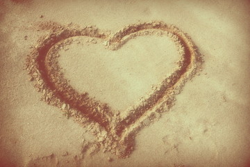 heart drawn on the sand travel on holiday to the sea and beaches