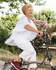 Mature woman cycling