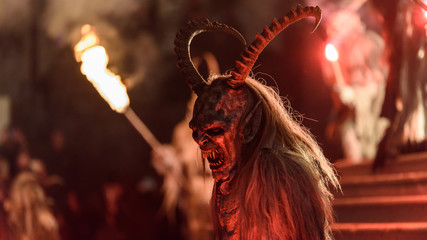 Krampus in the fire. Christmas devils.