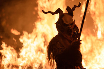 Krampus in the fire. Christmas devils.