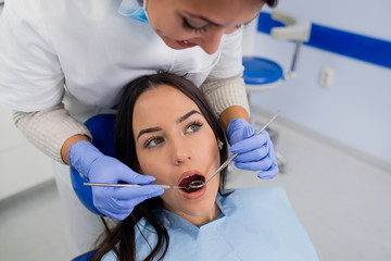 Fototapeta premium Girl receiving dental care
