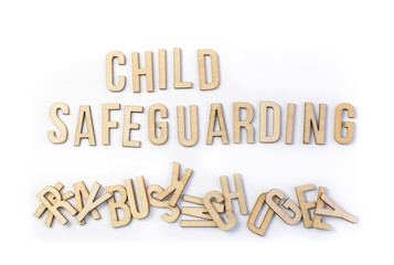 Safeguarding concept, word spelled out in wooden letters