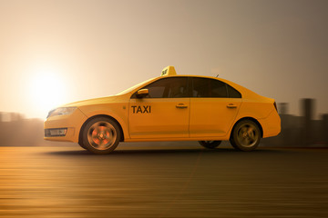 Fototapeta premium 3D rendering of a tellow taxi on motion
