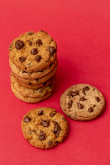 tasty cookies in detail, with red background.