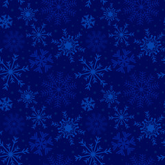 Fototapeta na wymiar Christmas holiday background with snowflakes and stars in blue. Abstract winter blue pattern..