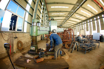 Fototapeta na wymiar workers work in the workshop of the factory,