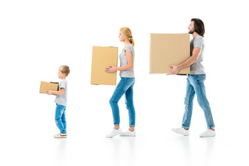 stylish parents and their son holding boxes isolated on white