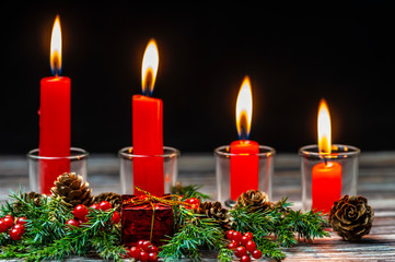Christmas candles on a black background