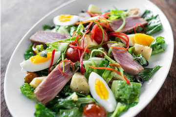 fresh seared raw tuna mixed vegetable salad  with mustard sauce